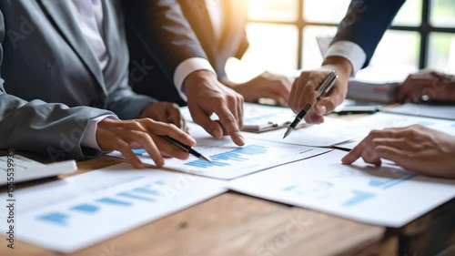 Wallpaper Mural Strategic Insights: Business Professionals Collaborating on Data Analysis and Review Torontodigital.ca