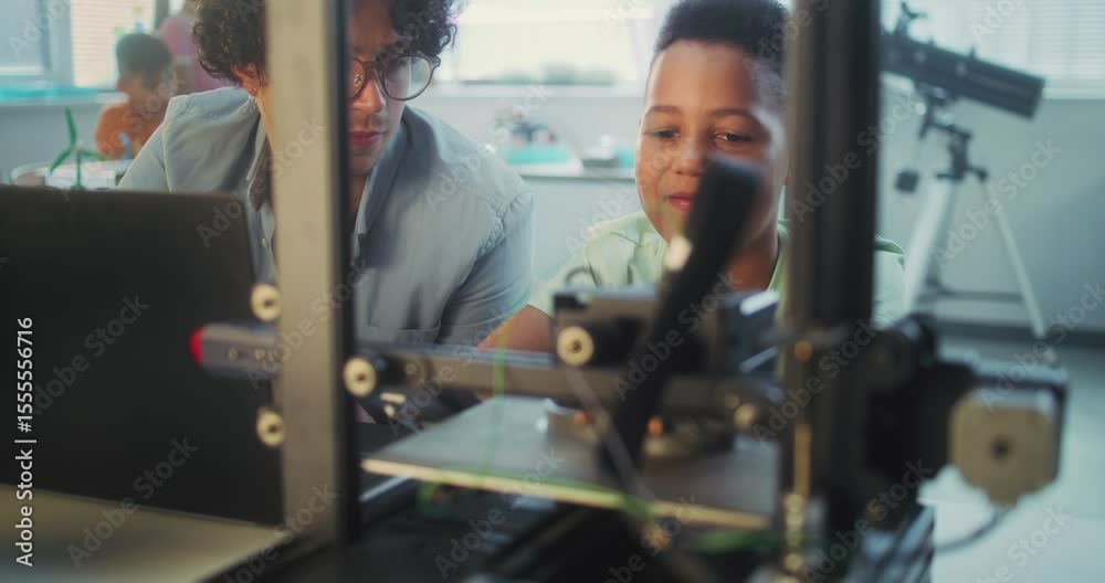 African American Elementary School Student Watching Printing Process on ...