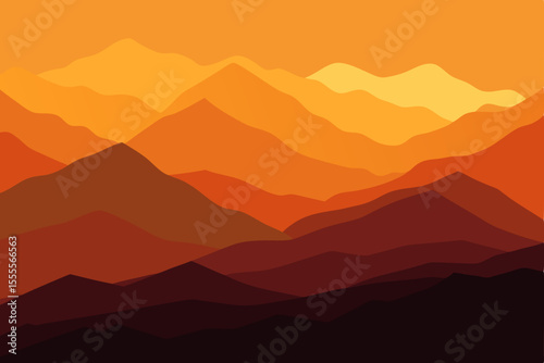Misty blue mountain landscape at sunset with a range of hills and a vibrant skyMisty blue mountain landscape at sunset with a range of hills and a vibrant sky