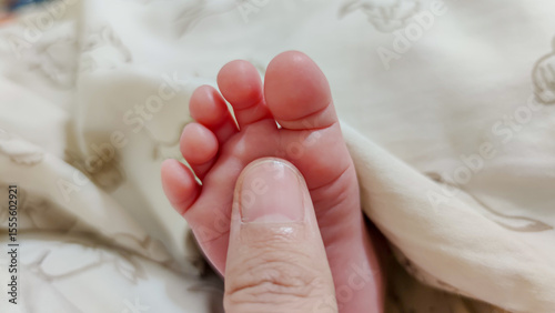 baby feet in bed