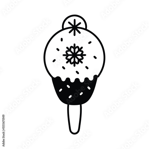 Festive holiday ice cream cone adorned with a delicate snowflake topping perfect for seasonal celebrations