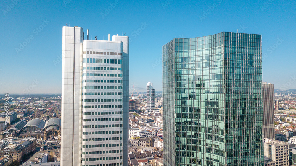 Obraz premium Frankfurt, Germany - September 20, 2020: Aerial view over the Main River, cityscape at sunset.
