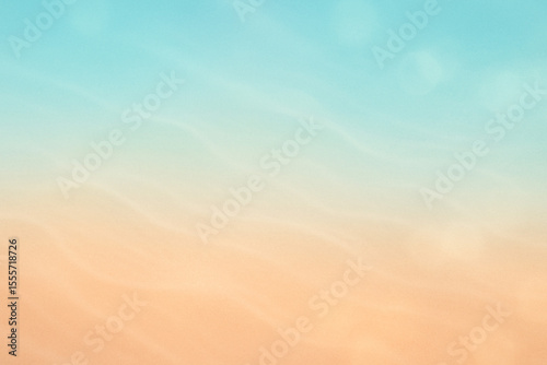 Blurred pastel beach-inspired backdrop in orange and blue with dreamy light overlay.
