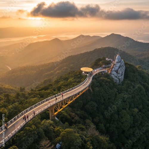 Aerial view Golden bridge at sunset in ba na hills two hands, Da nang Vietnam