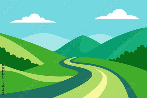 A very beautiful nature scene with a paved road and lush green grass on a sunny day