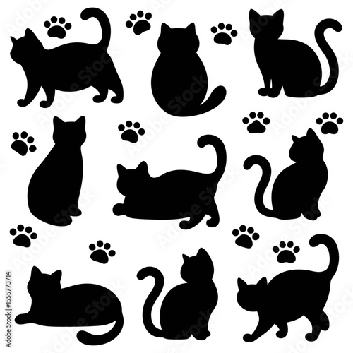A collection of nine black cat silhouettes with various poses and paw prints scattered about
