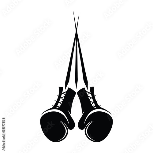 Pair of black boxing gloves with laces hanging isolated on white background