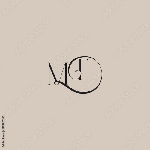 monogram wedding logo elegant and luxury style MT dinamyc curvy initial concept letter