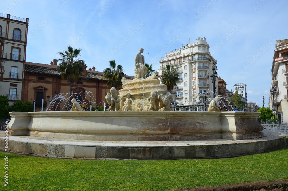 Fototapeta premium Seville, Spain 03.23.2019: The Hispalis fountain in the Puerta de Jerez roundabout