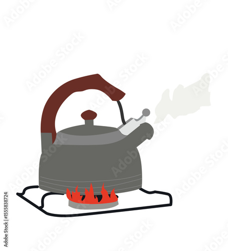 glass kettle with boiling water and steam on gas stove top 