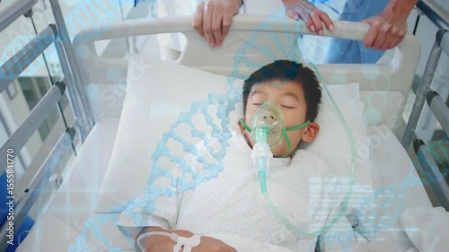 Hospital patient lying masked, nurse entering adjusting headboard for monitoring via DNA overlay