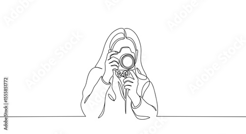 Girl taking macro photo of flower (International Photographer Day)  
