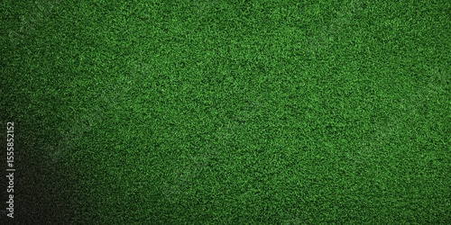 Green football soccer field grass texture background wallpaper with copy space.