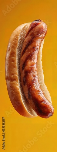 hot dog grilled sausage in a bun without toppings . aspect ratio 3:8