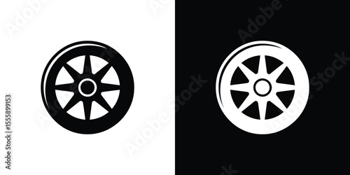 Black and White Featuring a Circular Symbol with Eight Spokes and a Circle