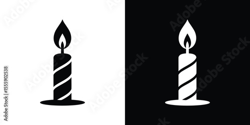 Dual Tone of Lit Swirled Candle on Black and White Backgrounds