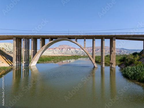 Nallihan Bird Sanctuary Ankara Turkey Majestic arch bridge spans a tranquil river. A stunning landscape view of a large arch bridge crossing a calm river. Turkiye best geology 