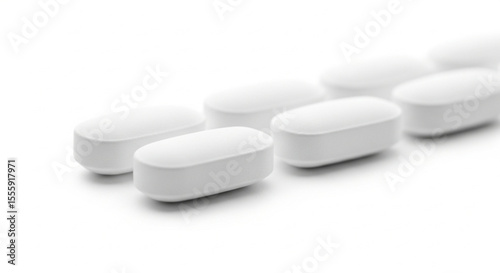white pills isolated on white background
