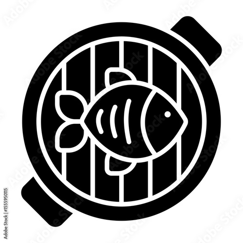A solid design icon of grilled fish