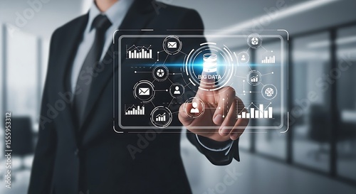 Businessman interacting with virtual data interface, navigating digital information with modern business strategy in a corporate environment.