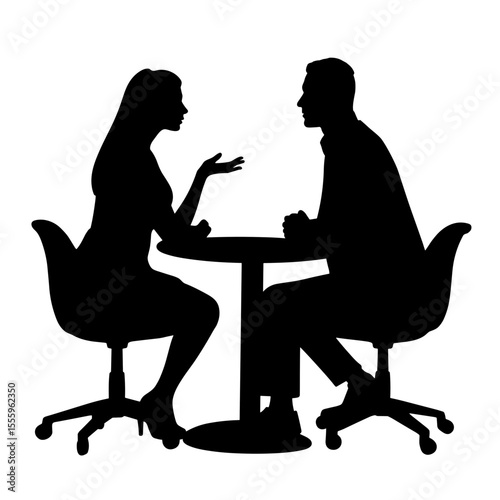 Silhouette of man and woman talking at a round table in conversation  