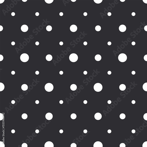 Stylish high-contrast polka dot seamless vector pattern in white on deep charcoal black background for fabric, gift wrap and digital design.