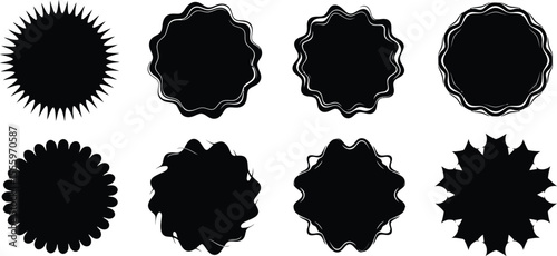 A collection of eight black circular shapes on a white background