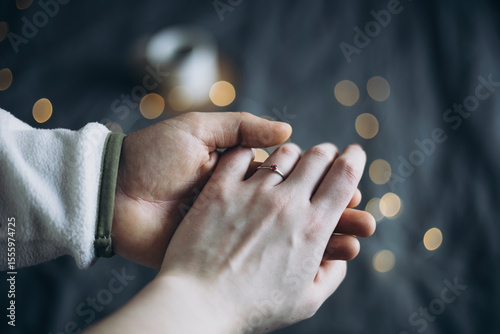 Young couple is getting engaged, man propose woman, new family celebration.