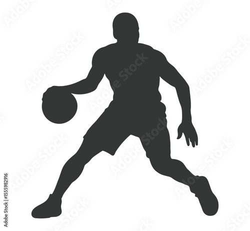 Silhouette of a male basketball player dribbling a ball