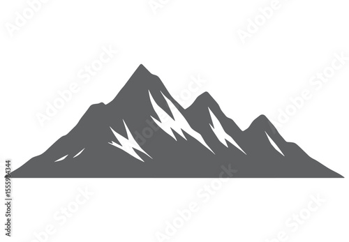 Grey mountain range with sharp peaks and snow accents