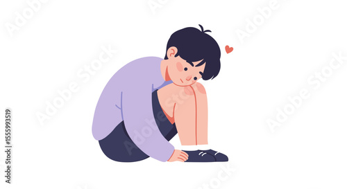 Boy resting head on knees while sitting in a relaxed posture  