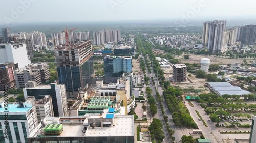 Aerial drone shot highlighting the organized grid layout of Noida’s city planning.