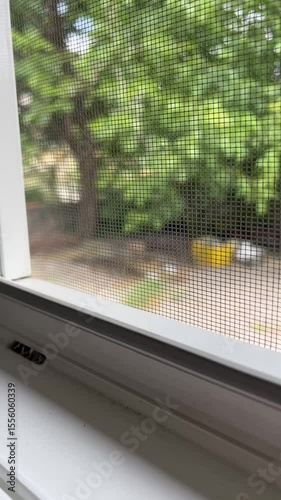 Fly screen mosquito net attached to window frame for insect protection