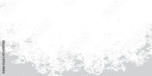 Abstract grunge background featuring a distressed black and white stone wall textureAbstract grunge background featuring a distressed black and white stone wall texture