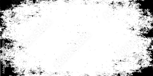 Abstract grunge background featuring a distressed black and white stone wall textureAbstract grunge background featuring a distressed black and white stone wall texture