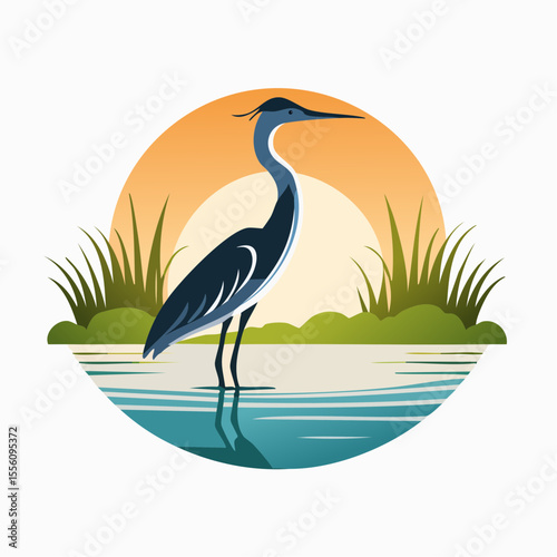 Graceful heron standing peacefully in calm water with a radiant sunset backdrop creating a serene and captivating natural scene.