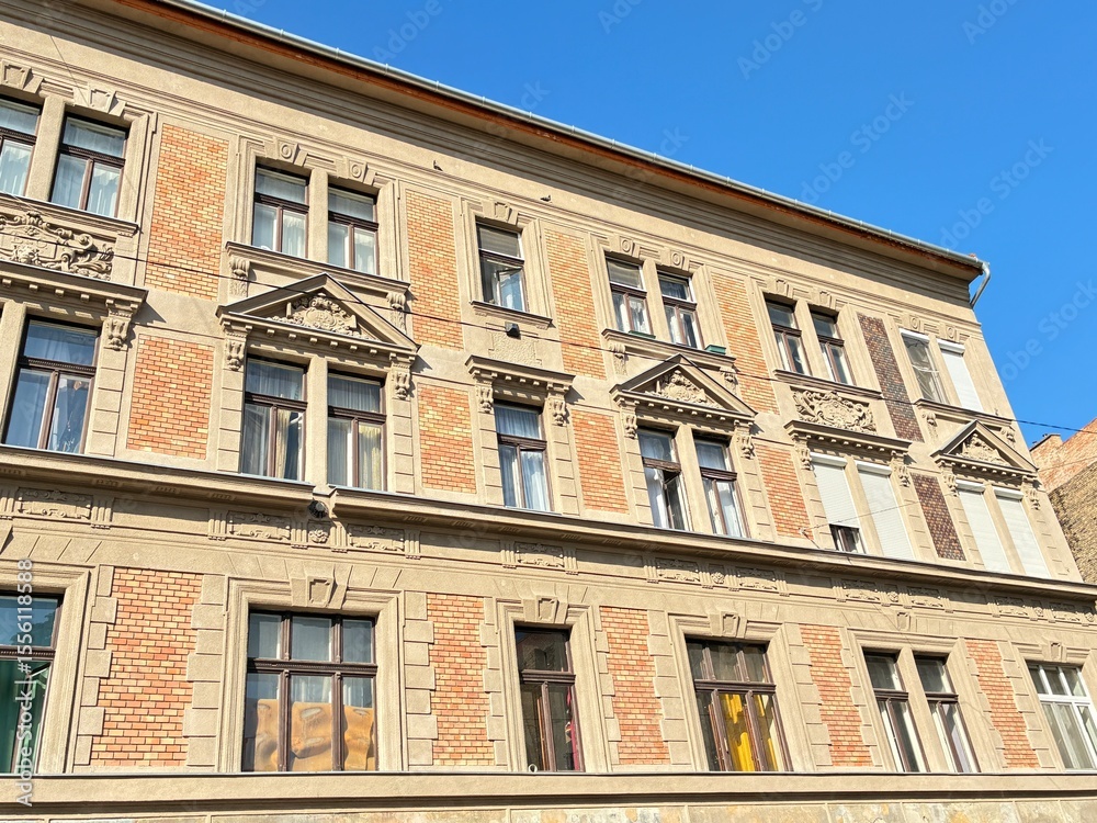 Fototapeta premium Old urban brick building facade.