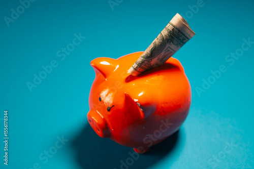 piggy bank and money on the table