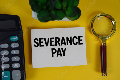 Severance Pay text with magnifying glass anc calculator on yellow background