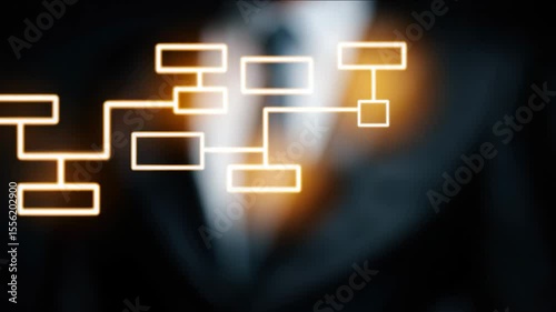 A hand is touching a flowchart diagram. The diagram appears to be interactive, and symbolizes processes, connections, and data flow