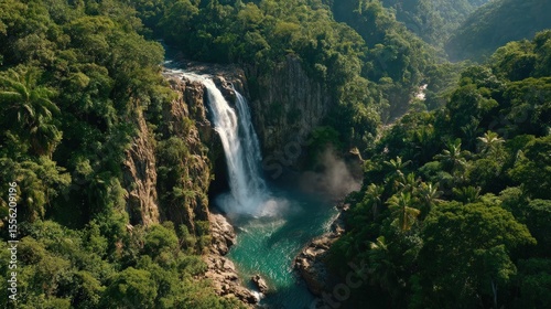 Aerial View of Waterfall in Costa Rican Rainforest with Tropical Birds and Morning Mist