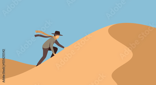 Adventurer climbing a sandy desert dune under a clear blue sky