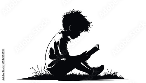 A Silhouette of a boy reading a book