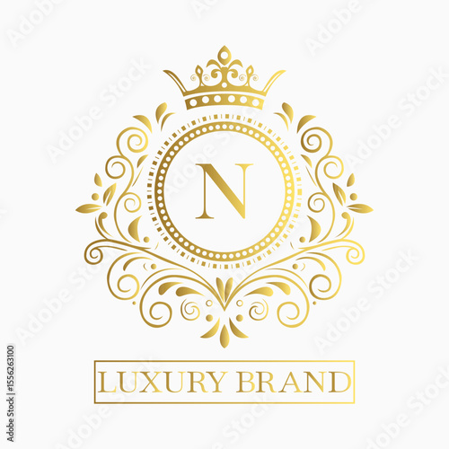 Luxurious and elegant logo design with a stylized letter N in gold featuring regal floral embellishments