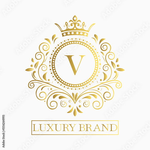 Luxurious and elegant logo design with a stylized letter V in gold featuring regal floral embellishments