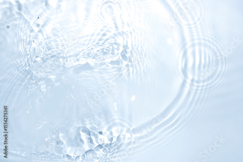 The surface of the water is clear, blue, soft and shiny.
