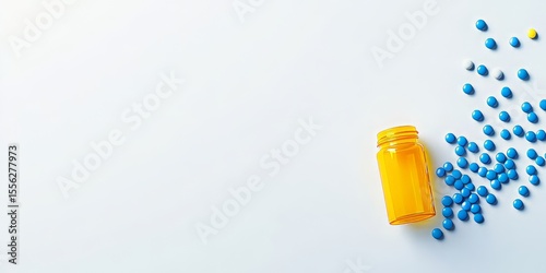 Yellow medicine container with blue and yellow pills spilled beside it suggests healthcare supplies in a clinical setting featuring medical elements creating an impressive visual impact.