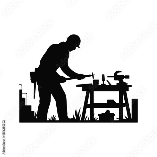 Silhouette of a Carpenter Working at a Workbench with Tools