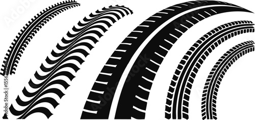 Tire tracks in various designs on a background showing different tread patterns shapes