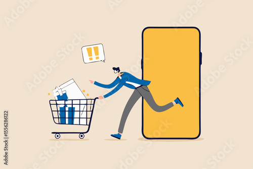 Online shopping or mobile shopping app concept, young man consumer holding credit cart pushing full of goods and box packages in shopping cart trolley running from website or app on mobile smart phone